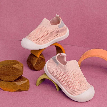 Pink breathable baby shoes designed for first walkers
